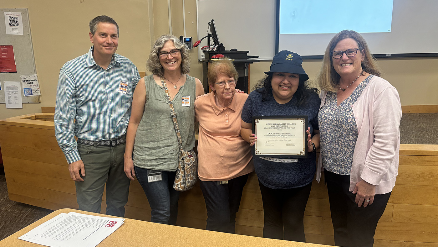 CC Contreras accepting her 2026 CLassified Employee of the Year award